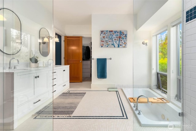 10611 NE 155th Pl, Bothell, WA 98011 - full bathroom with double vanity and a tub with jets