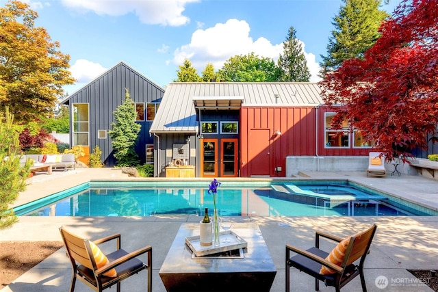 10611 NE 155th Pl, Bothell, WA 98011 - view of pool featuring a storage structure, a patio area, an outdoor structure, and a pool with connected hot tub