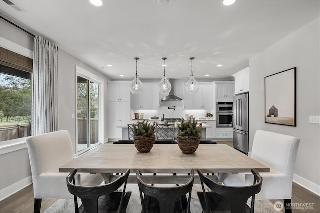 14636 203rd Ave E Unit 19, Bonney Lake, WA 98391 - dining room with baseboards, recessed lighting, and dark wood finished floors