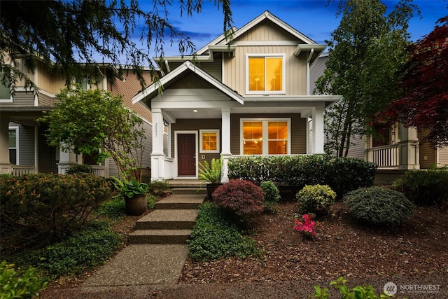 2805 SW Bataan St, Seattle, WA 98126 - view of front of property featuring a porch and board and batten siding