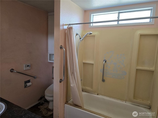 bathroom with shower / bath combo and toilet