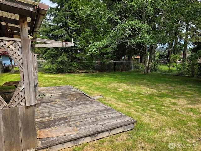 view of yard featuring a wooden deck
