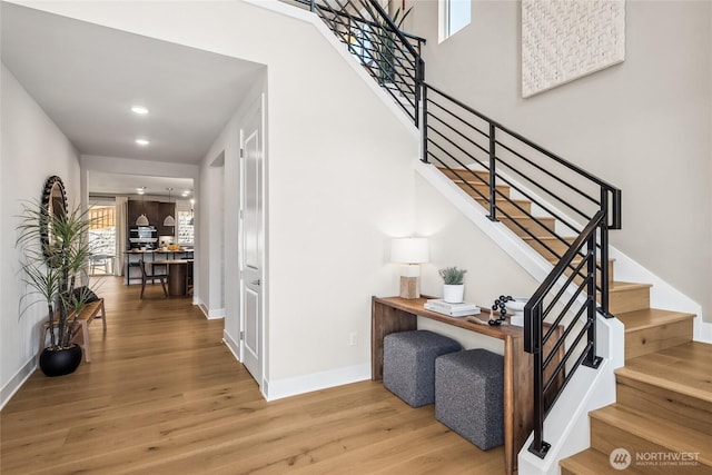 20304 154th St E Unit 15, Bonney Lake, WA 98391 - stairs with wood finished floors, healthy amount of natural light, baseboards, and recessed lighting