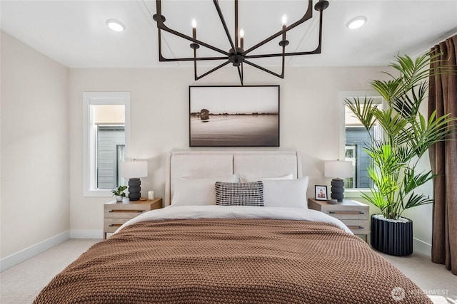 20304 154th St E Unit 15, Bonney Lake, WA 98391 - bedroom featuring a chandelier, light carpet, and baseboards