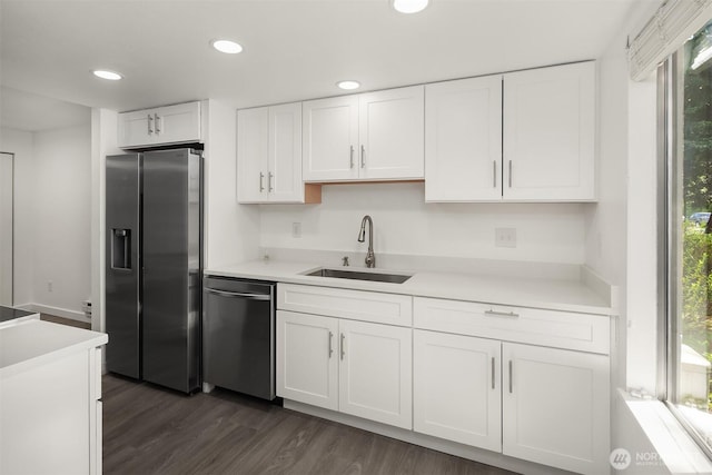 17537 151st Ave SE Unit 9-4, Renton, WA 98058 - kitchen featuring appliances with stainless steel finishes, a sink, white cabinets, healthy amount of natural light, and recessed lighting