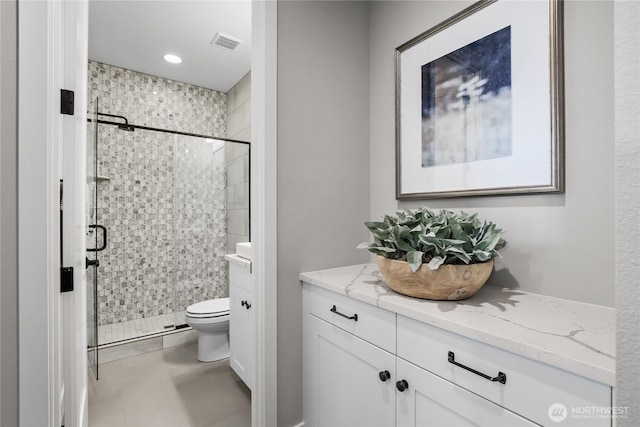 15321 204th Ave E Unit 56, Bonney Lake, WA 98391 - bathroom featuring a stall shower, vanity, toilet, and recessed lighting