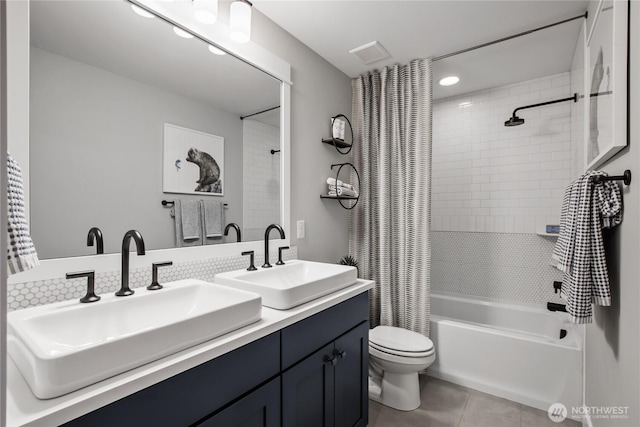 15321 204th Ave E Unit 56, Bonney Lake, WA 98391 - bathroom featuring tile patterned floors, shower / bath combo, toilet, double vanity, and recessed lighting