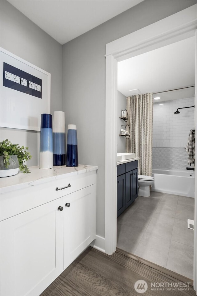 15321 204th Ave E Unit 56, Bonney Lake, WA 98391 - bathroom with vanity, shower / bath combination with curtain, and toilet