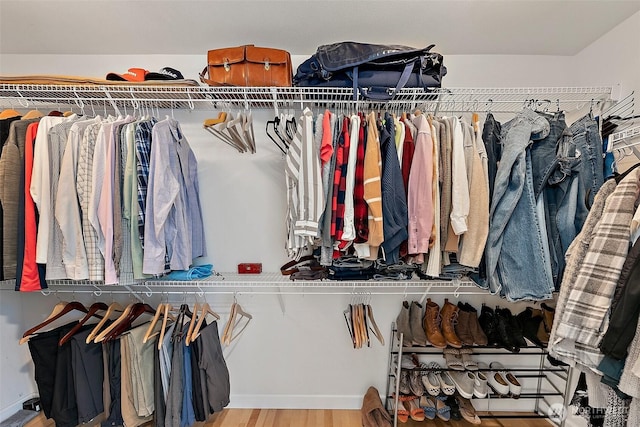 spacious closet featuring wood finished floors