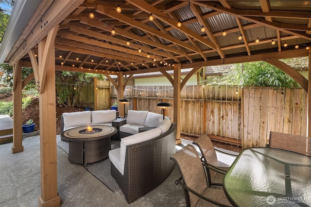 1020 Greenwood Blvd SW, Issaquah, WA 98027 - view of patio / terrace featuring a gazebo, fence, and an outdoor living space with a fire pit
