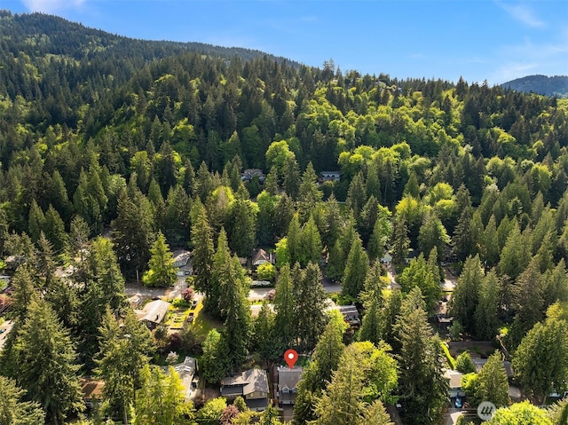 1020 Greenwood Blvd SW, Issaquah, WA 98027 - drone / aerial view of a forest and a mountain backdrop