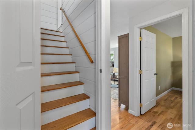 8155 28th Ave SW, Seattle, WA 98126 - staircase with wood finished floors and baseboards