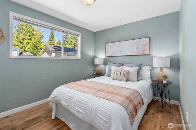 8155 28th Ave SW, Seattle, WA 98126 - bedroom with wood finished floors and baseboards