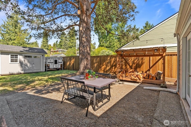 8155 28th Ave SW, Seattle, WA 98126 - fenced backyard featuring outdoor dining area and a patio area
