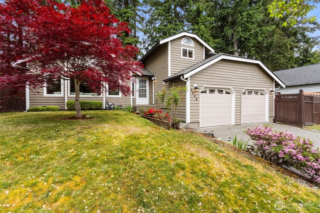 view of front of property with an attached garage and driveway