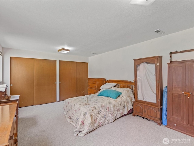 17417 29th Dr SE, Bothell, WA 98012 - bedroom with carpet flooring and two closets