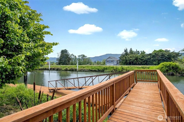 45 N Welcome Slough Rd, Cathlamet, WA 98612 - wooden deck with a water and mountain view