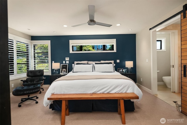2821 Fairview Ave E Unit 5, Seattle, WA 98102 - bedroom featuring a barn door, recessed lighting, baseboards, and a ceiling fan