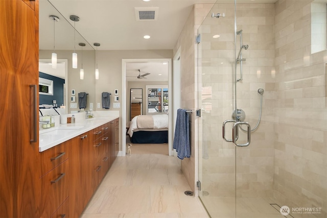2821 Fairview Ave E Unit 5, Seattle, WA 98102 - ensuite bathroom featuring double vanity, a stall shower, and recessed lighting