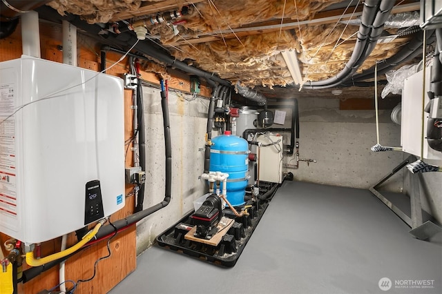 2821 Fairview Ave E Unit 5, Seattle, WA 98102 - unfinished basement featuring water heater and a water pressure tank