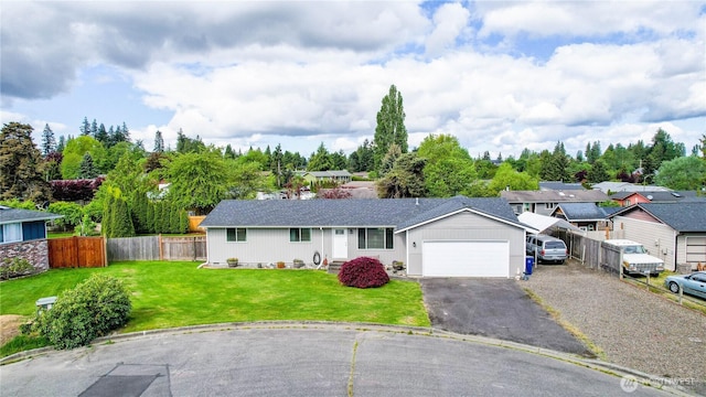 2313 N 19th Pl, Mount Vernon, WA 98273 - ranch-style house with a garage, driveway, roof with shingles, and a residential view