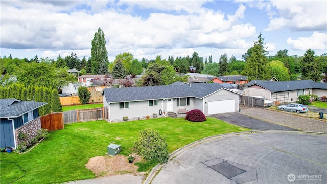 2313 N 19th Pl, Mount Vernon, WA 98273 - single story home featuring asphalt driveway, an attached garage, a residential view, and roof with shingles