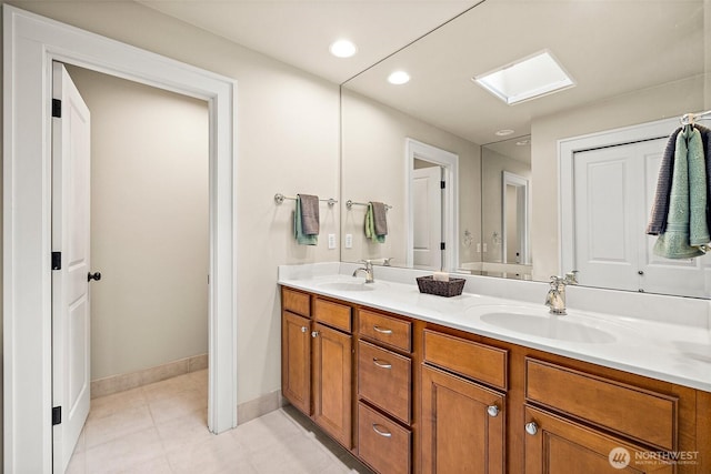 11423 SE 259th St Unit 101, Kent, WA 98030 - full bath with double vanity, baseboards, tile patterned floors, and recessed lighting