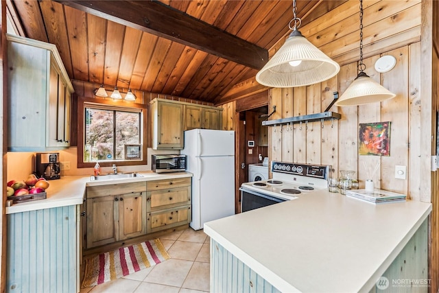 8310 E State Route 106, Union, WA 98592 - kitchen featuring white appliances, wood ceiling with exposed beams, light tile patterned flooring, a sink, and light countertops