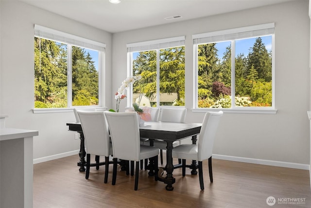 1803 135th Street Ct S, Tacoma, WA 98444 - dining area with baseboards and wood finished floors