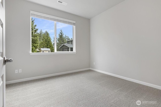 1803 135th Street Ct S, Tacoma, WA 98444 - spare room with baseboards and carpet