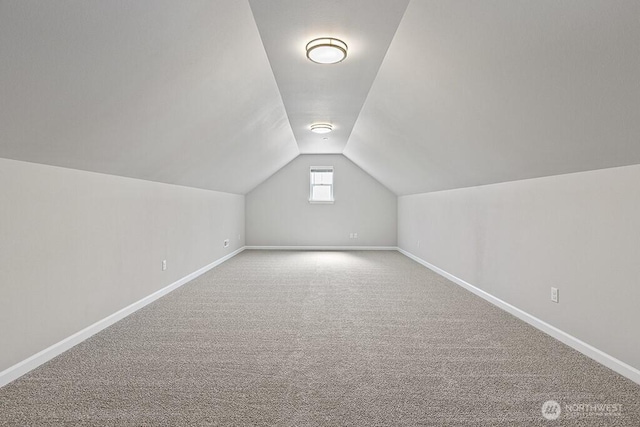 1803 135th Street Ct S, Tacoma, WA 98444 - bonus room with baseboards, carpet, and vaulted ceiling