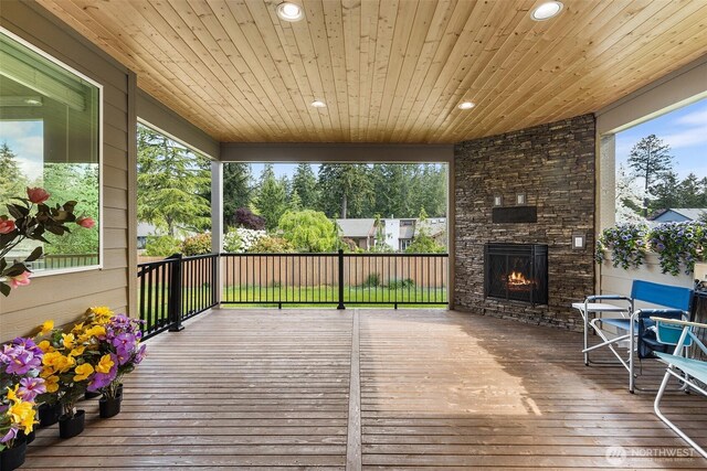 1803 135th Street Ct S, Tacoma, WA 98444 - deck featuring an outdoor stone fireplace