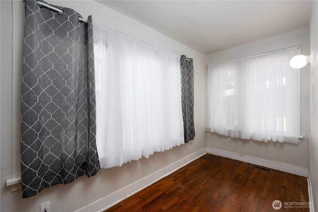 766 120th St S Unit A & B, Tacoma, WA 98444 - unfurnished room with baseboards and wood finished floors
