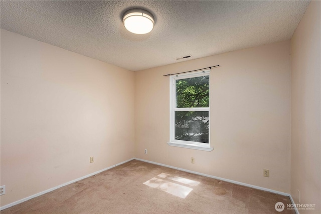 766 120th St S Unit A & B, Tacoma, WA 98444 - carpeted spare room with a textured ceiling and baseboards
