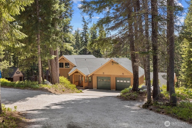 2677 Sumac Ln, Leavenworth, WA 98826 - chalet / cabin featuring driveway and an attached garage