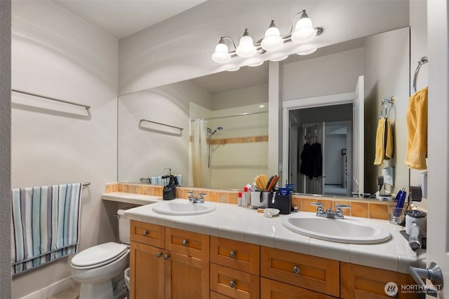 1000 Cabin Creek Ln SW Unit C204, Issaquah, WA 98027 - full bath with toilet, a shower with shower curtain, and double vanity