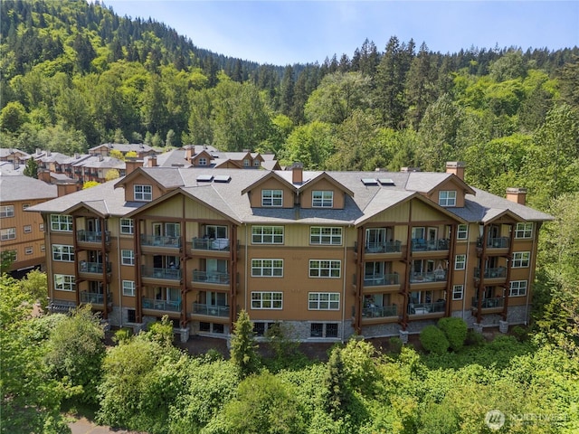1000 Cabin Creek Ln SW Unit C204, Issaquah, WA 98027 - view of apartment building / complex featuring a view of trees