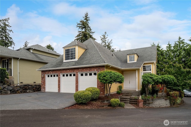 9702 S 230th Pl, Kent, WA 98031 - traditional home with an attached garage, concrete driveway, roof with shingles, and brick siding