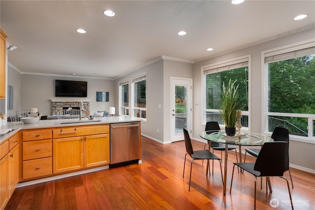 9702 S 230th Pl, Kent, WA 98031 - kitchen featuring dishwasher, a peninsula, plenty of natural light, a stone fireplace, and recessed lighting