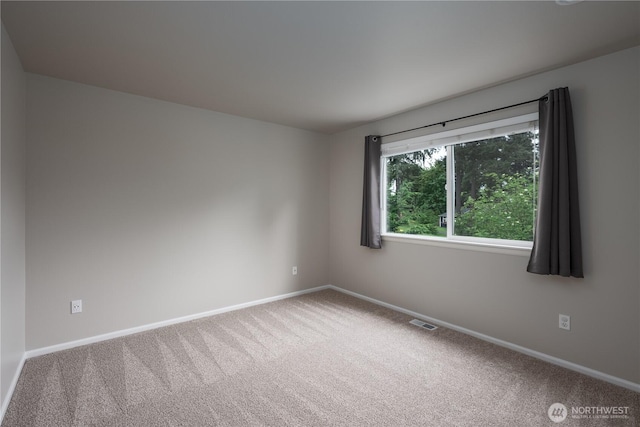 9702 S 230th Pl, Kent, WA 98031 - carpeted spare room with baseboards