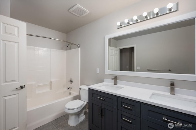 9702 S 230th Pl, Kent, WA 98031 - bathroom with toilet, tile patterned flooring, double vanity, and shower / bath combination