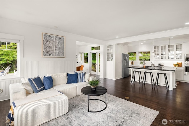 7934 Lake View Ln, Mercer Island, WA 98040 - living area with a wainscoted wall, plenty of natural light, dark wood-type flooring, and recessed lighting