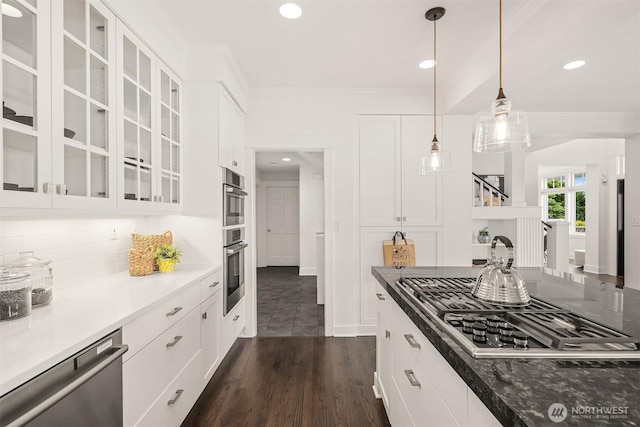 7934 Lake View Ln, Mercer Island, WA 98040 - kitchen featuring gas cooktop, stainless steel dishwasher, decorative backsplash, white cabinetry, and ornamental molding