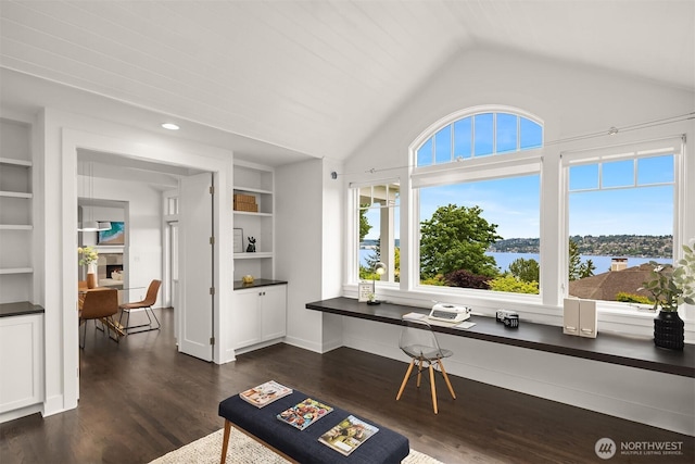7934 Lake View Ln, Mercer Island, WA 98040 - living area with built in shelves, dark wood-type flooring, lofted ceiling, and a water view