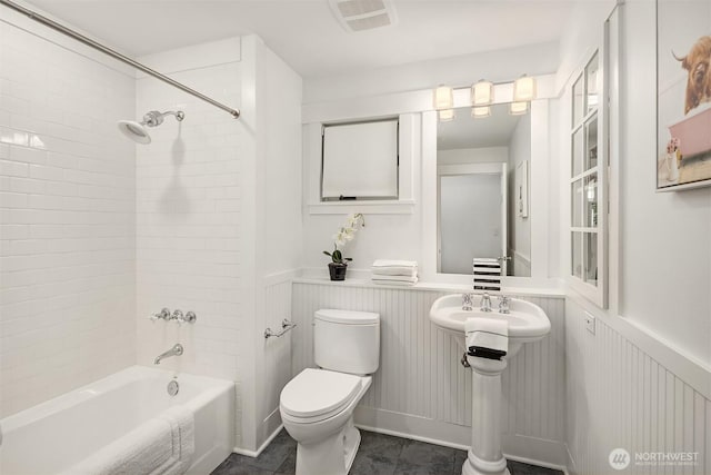 7934 Lake View Ln, Mercer Island, WA 98040 - full bath featuring toilet, a wainscoted wall,  shower combination, and a sink