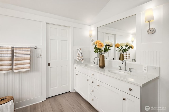 7934 Lake View Ln, Mercer Island, WA 98040 - bathroom with double vanity and wood finished floors
