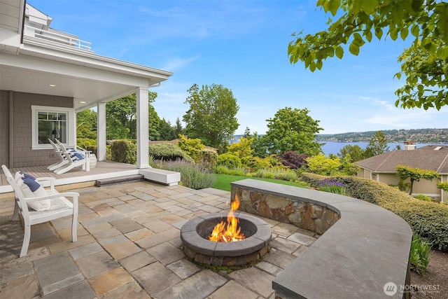 7934 Lake View Ln, Mercer Island, WA 98040 - view of patio / terrace featuring a fire pit and a water view