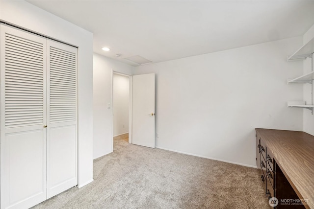 unfurnished office with light carpet, recessed lighting, and baseboards