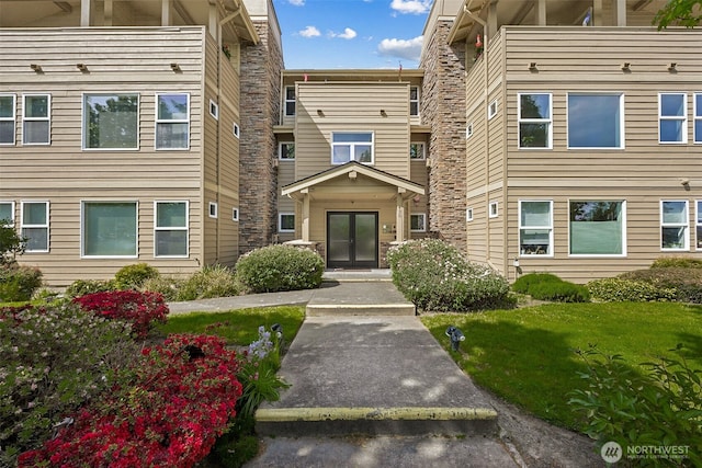 430 SW 156th St Unit 204, Burien, WA 98166 - view of front of house featuring french doors and a front lawn