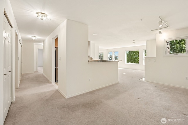 430 SW 156th St Unit 204, Burien, WA 98166 - corridor featuring light colored carpet and baseboards